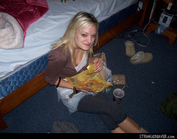 girl eating taco